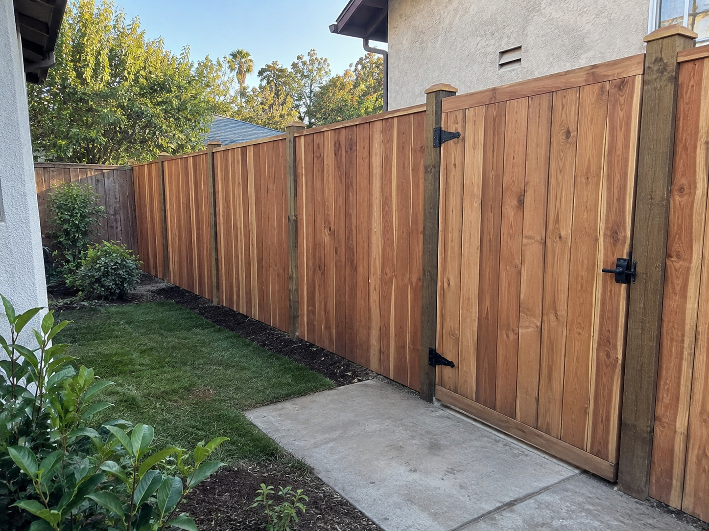 Custom fencing and gate installation by Green Tech Remodeling